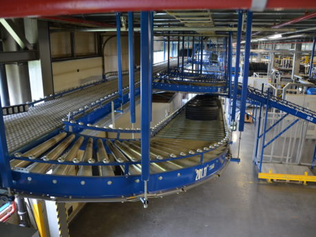 Conveyor system for transporting tires